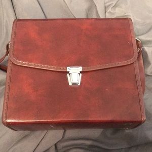 Hard cover brown cross body bag
